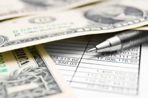 Invoice and dollar bills